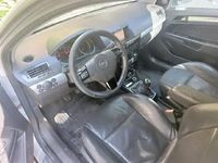 Second-hand Opel Astra 110 CP (80 kW) 2009 Auriu Coupe