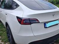 Second-hand Tesla Model Y Long Range AWD 258 kW (351 CP) 2023 Culoarealb SUV