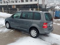 second-hand VW Touran an 2006, 1.9 tdi = rate cu buletinul