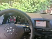 Second-hand Opel Astra 110 CP (80 kW) 2009 Auriu Coupe