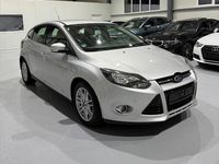 Second-hand Ford Focus Titanium 150 CP (110 kW) 2012 Culoareargint Hatchback
