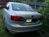 Second-hand VW Jetta 105 CP (77 kW) 2011 Argintiu Berlinǎ
