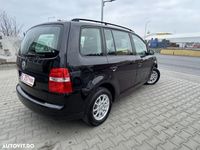 second-hand VW Touran 2.0TDI Highline Aut