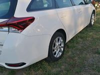Second-hand Toyota Auris Hybrid Luna 99 CP (72 kW) 2016 Culoarealb Break
