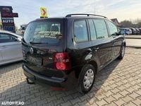 Second-hand VW Touran Comfortline 140 CP (102 kW) 2009 Culoarenegru Monovolum