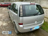 Second-hand Opel Meriva 66 CP (48 kW) 2010 Argintiu Monovolum