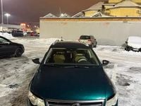 Second-hand VW Passat R-line 170 CP (125 kW) 2010 Break