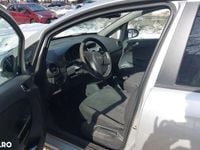 Second-hand Opel Corsa 100 CP (73 kW) 2011 Culoareargint Hatchback