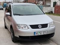 second-hand VW Touran 1.9 TDI 7 LOCURI