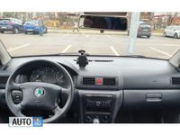 Second-hand Skoda Octavia Tour 90 CP (66 kW) 2007 Negru Berlinǎ