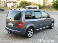 second-hand VW Touran 1.9 diesel TDI 105 CP cutie automată DSG 7 locuri