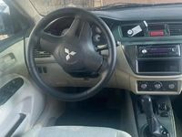 Second-hand Mitsubishi Lancer 102 CP (75 kW) 2008 Negru Berlinǎ