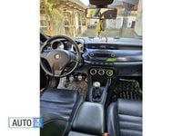 Second-hand Alfa Romeo Giulietta 140 CP (102 kW) 2011 Rosu Hatchback