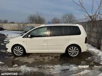 Second-hand VW Touran R-line Edition 140 CP (102 kW) 2010 Culoarealb Monovolum