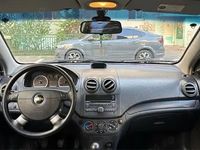 Second-hand Chevrolet Aveo 84 CP (61 kW) 2011 Negru Berlinǎ