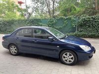 Second-hand Mitsubishi Lancer 98 CP (72 kW) 2009 Albastru Berlinǎ