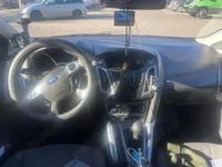 Second-hand Ford Focus 130 CP (95 kW) 2014 Argintiu Berlinǎ