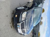 Second-hand VW Touran 105 CP (77 kW) 2008 Negru Monovolum