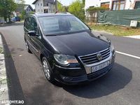 Second-hand VW Touran Highline 140 CP (102 kW) 2009 Culoarenegru Monovolum