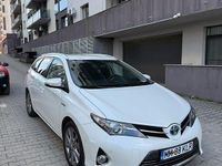 Second-hand Toyota Auris Hybrid Luna 99 CP (72 kW) 2014 Culoarealb Break