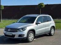 Second-hand VW Tiguan Sportline 163 CP (119 kW) 2011 Culoareargint SUV