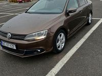 Second-hand VW Jetta Highline 105 CP (77 kW) 2012 Culoaremaro Berlinǎ