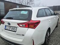 Second-hand Toyota Auris Hybrid 98 CP (72 kW) 2013 Break