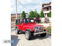 Second-hand Jeep Wrangler 130 CP (95 kW) 1993 Rosu SUV