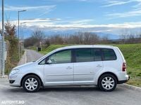 Second-hand VW Touran Comfortline 140 CP (102 kW) 2007 Culoareargint Monovolum