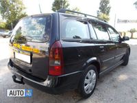 Second-hand Opel Astra 101 CP (74 kW) 2004 Negru Break