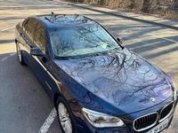 Second-hand BMW 740 Comfort Edition 313 CP (230 kW) 2014 Albastru Berlinǎ