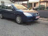 Second-hand Mitsubishi Lancer Invite 98 CP (72 kW) 2005 Negru Berlinǎ