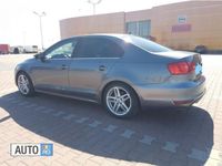 Second-hand VW Jetta 105 CP (77 kW) 2012 Gri Berlinǎ