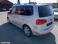 Second-hand VW Touran Comfortline 140 CP (102 kW) 2010 Culoareargint Monovolum