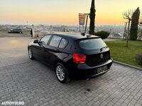 Second-hand BMW 116 136 CP (100 kW) 2013 Culoarenegru Hatchback