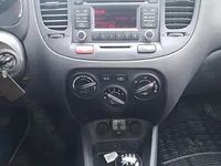 Second-hand Kia Rio 97 CP (71 kW) 2011 Negru Hatchback