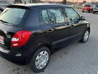 Second-hand Skoda Fabia 79 CP (58 kW) 2010 Negru Hatchback