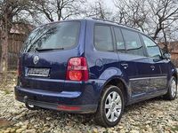 Second-hand VW Touran Highline 140 CP (102 kW) 2008 Culoarealbastru Monovolum