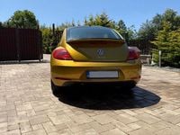 Second-hand VW Beetle 160 CP (117 kW) 2012 Culoaregalbeuriu Hatchback