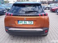 Second-hand Peugeot e-2008 GT 100 kW (136 CP) 2021 Portocaliu SUV