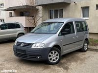 Second-hand VW Caddy Maxi 105 CP (77 kW) 2009 Culoareargint Monovolum