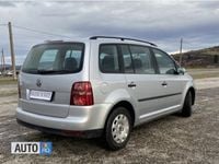 Second-hand VW Touran 105 CP (77 kW) 2007 Argintiu Monovolum