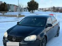 Second-hand VW Jetta 140 CP (102 kW) 2009 Negru Berlinǎ