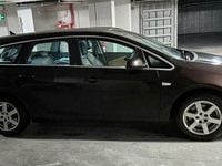 Second-hand Opel Astra 165 CP (121 kW) 2011 Culoaremaro Break