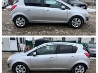 Second-hand Opel Corsa Edition 100 CP (73 kW) 2011 Culoareargint Hatchback