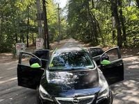 Second-hand Opel Astra Edition 180 CP (132 kW) 2010 Negru Berlinǎ