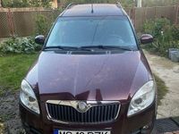 Second-hand Skoda Roomster Style 105 CP (77 kW) 2009 Culoarerosu Monovolum