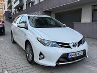 Second-hand Toyota Auris Hybrid Luna 99 CP (72 kW) 2014 Culoarealb Break