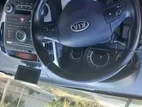 Second-hand Kia Ceed 116 CP (85 kW) 2010 Rosu Hatchback