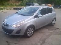 Second-hand Opel Corsa 75 CP (55 kW) 2011 Argintiu Hatchback